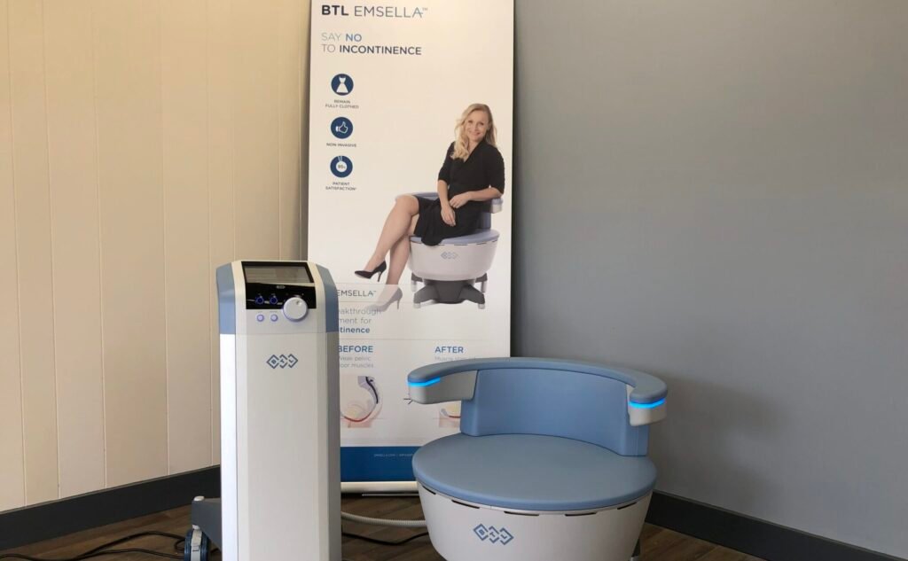 emsella chair and banner